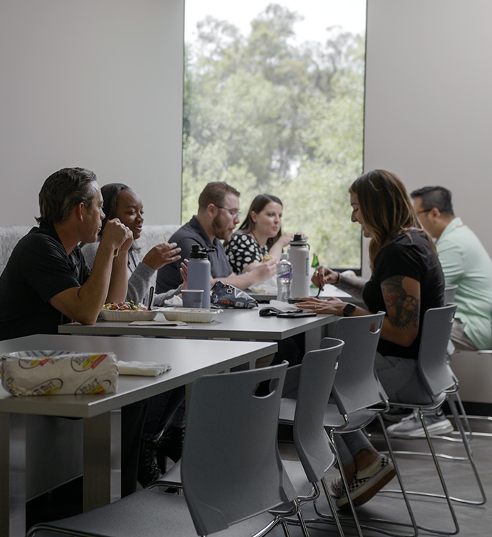  TaxAudit Team Members eating lunch in the breakroom