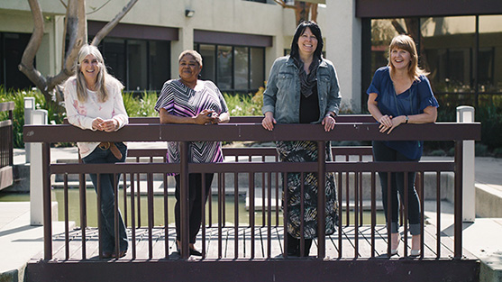 TaxAudit team members standing outside the Santa Ana, CA office