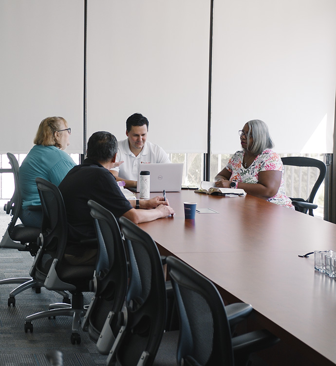 TaxAudit team members in one of the many Santa Ana conference rooms